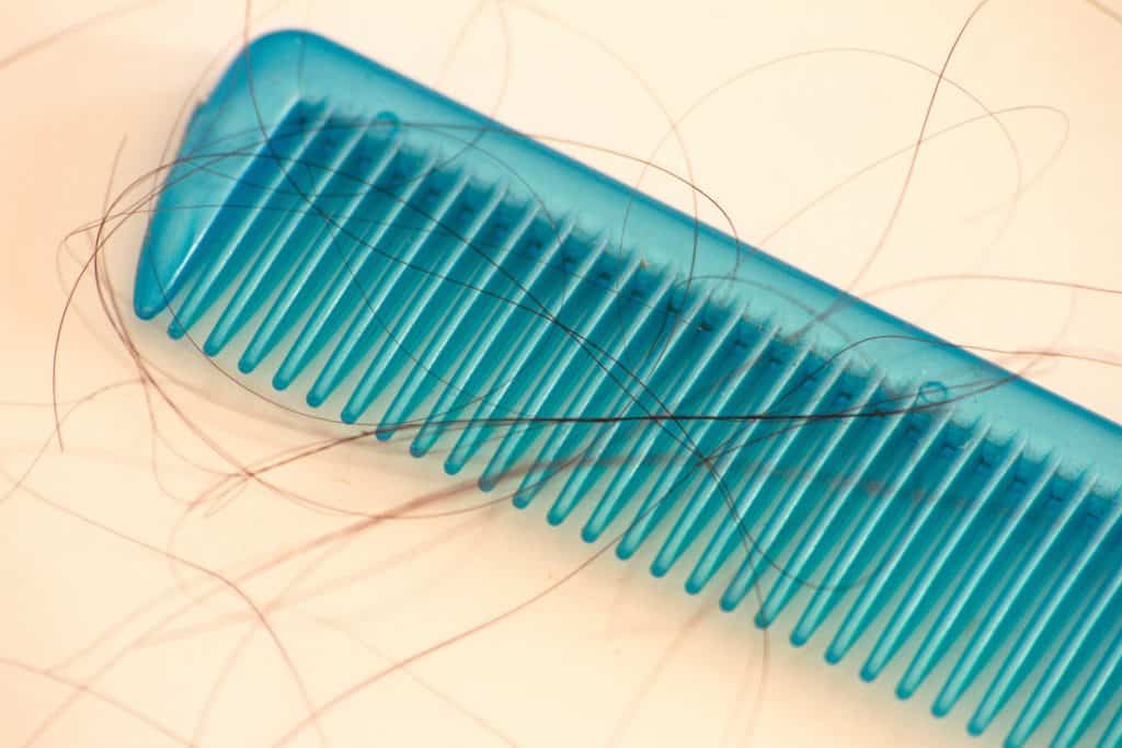 Por que Minoxidil faz o cabelo crescer?