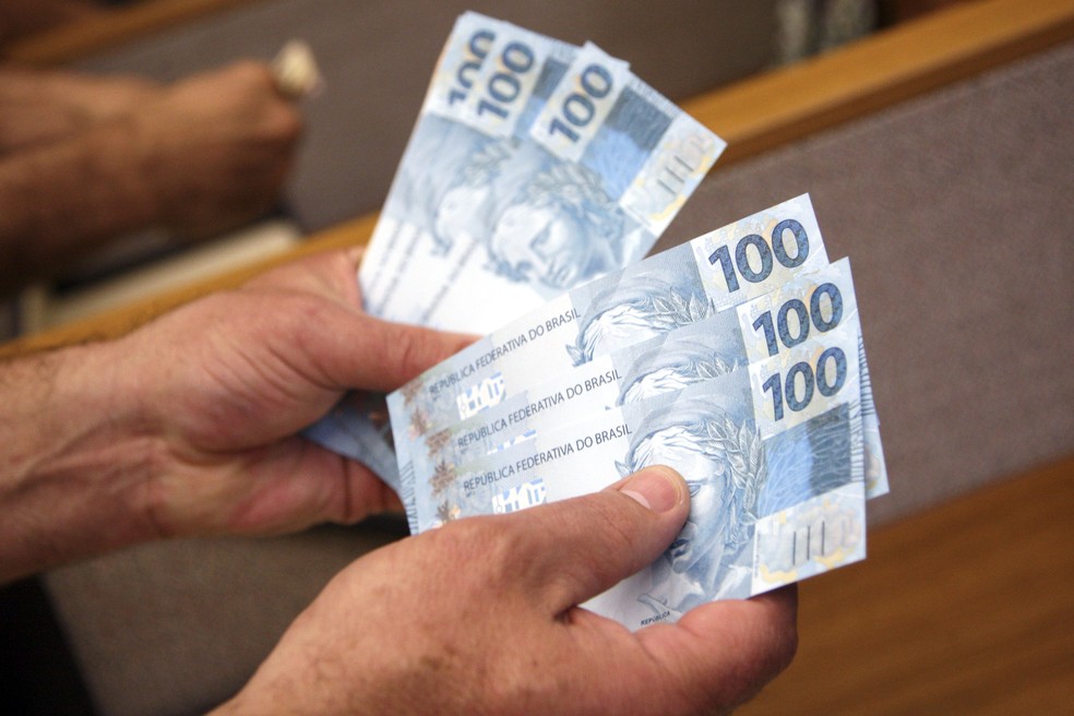 Uso de dinheiro em espécie deve diminuir nos próximos cinco anos, diz BC | Finanças